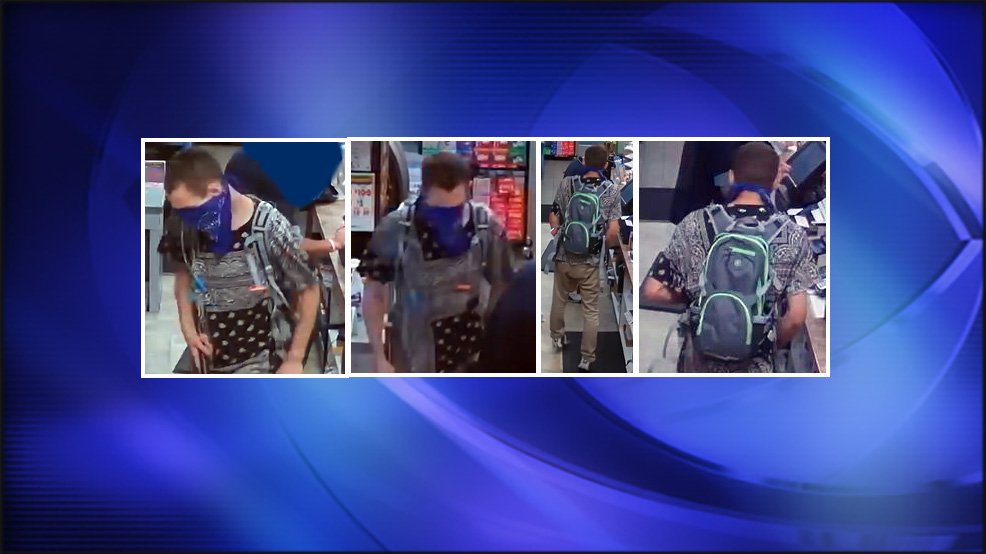 A man is on the run after robbing a gas station and attacking the store's clerk Wednesday. The clerk received minor injuries after the attack. The suspect is described as a white male that is tall with a slender build and covering his face with a blue bandana.