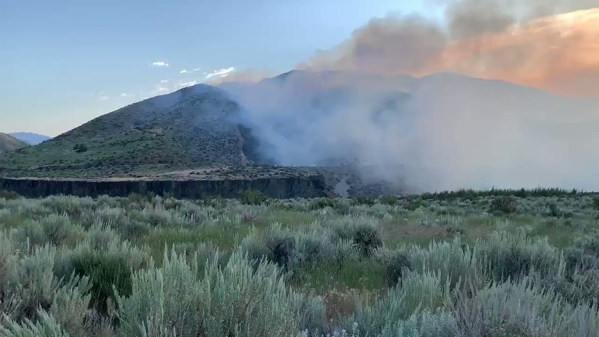 The Lucky Fire continues to burn near Lucky Peak State Park right off the Highway 21 high bridge. Lots of smoke pouring out of the hillside, crews digging containment lines
